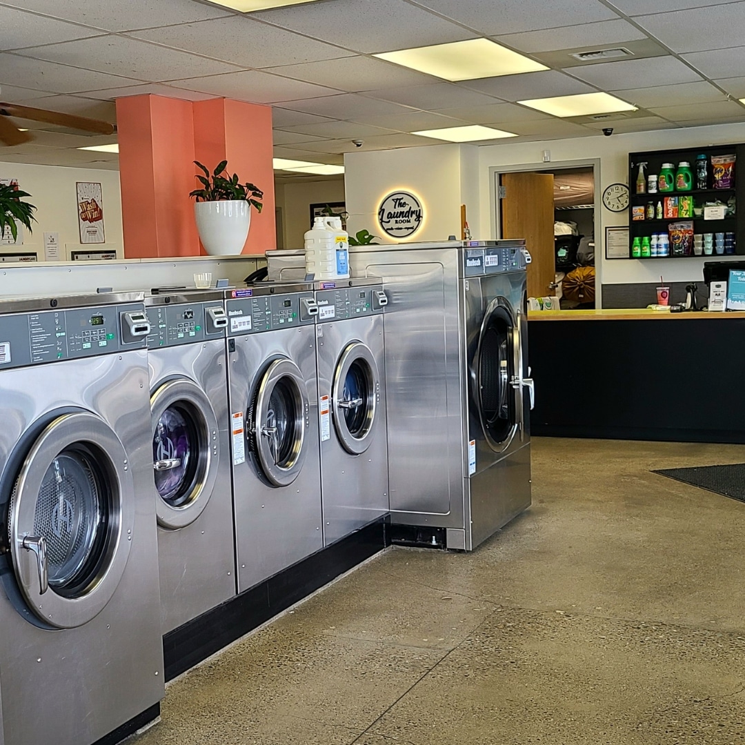 Spacious laundry room with multiple washing machines at The Laundry Room – Best laundry services Spokane.